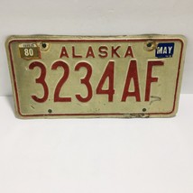 Vintage Alaska License Plate Expired 1980 Red Embossed 3234AF Wall Decor Rare - £26.08 GBP