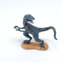 TM &amp; UNI Velociraptor  Dinosaur Figure - $2.96