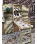 Wall mounted garden bar with fold down table. - $160.00