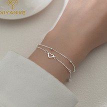 XIYASilver Color  Double Love Heart Hollow Round Beads Bracelet Female Fashion R - £8.66 GBP