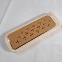 Vintage Avon Lint Brush remover for clothes Travel Folding 1982 cream go... - $15.00