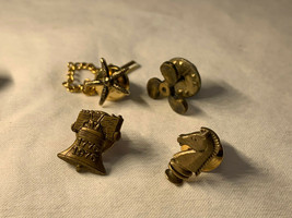 Lot of 4 Tie Pins Vtg Goldtone Liberty Bell Propeller Horse Knight Starfish - £24.01 GBP