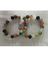 Multicolored stretch bracelets made with a variety of beautiful beads. - €21,71 EUR