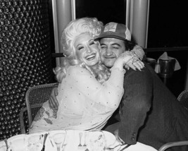 Dolly Parton hugs John Belushi at 1980 party 8x10 inch photo - £8.72 GBP