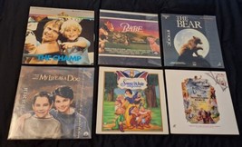 6 Laserdiscs- Snow White,  The Never Ending Story II, Babe, The Bear, The Champ - $27.00