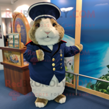 Navy Guinea Pig mascot costume character dressed with a Long Sleeve Tee and Wall - $1,339.00