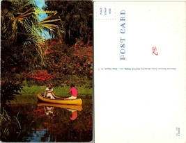 Man and Woman Canoeing Somewhere Tropical Pretty Flowers Canoe Vintage Postcard - £7.51 GBP