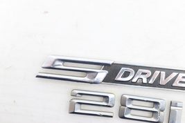 13-15 BMW X1 SDRIVE28I FRONT DOOR EMBLEM BADGE E2546 image 2
