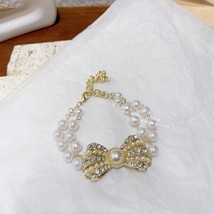 MENGJIQIAO Korean Vintage Elegant Pearl Bowknot Drop Earrings For Women Girls Fa - £7.85 GBP