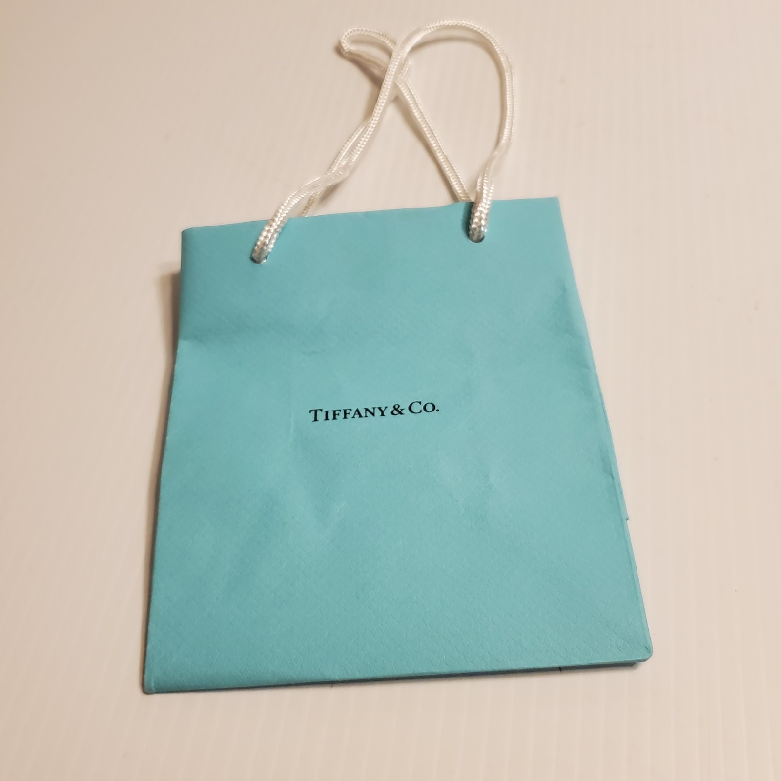 Tiffany & Co paper  gift bag. Very good shape. Teal 6x5x3 Lot 1 - $11.00