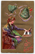 Postcard Embossed Merry Christmas Bells Woman Purple Playing Piano Greet... - £7.91 GBP