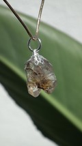 Uv reactive crystal pendant // Petroleum quartz // Terminated quartz - $35.00