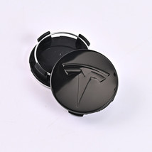 4 pcs 56mm Tesla Wheel Center Cap glossy black emblem Hub caps - $337.25 MXN