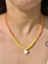 Sunset Starfish Necklace - $167.57 MXN