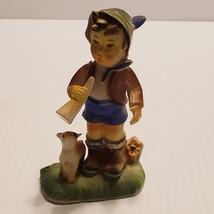 Little boy with puppy dog figurine made in Hong Kong  - $10.00