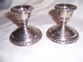 PAIR of  VINTAGE  ROGERS WEIGHTED SILVER  CANDLESTICK HOLDERS HALLMARKED - £65.58 GBP