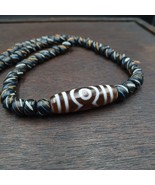 Collier amulette Dzi à motifs uniques indo tibétains de l&#39;Himalaya 3 yeu... - €94,01 EUR