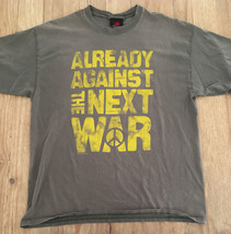 T SHIRT Already Against The Next War Zion Rootswear 1X Olive Green 2008 Anti war - £21.53 GBP