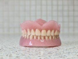 Full upper and lower dentures/false teeth, Brand new. - $135.00