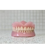 Full upper and lower dentures/false teeth, Brand new. - $135.00