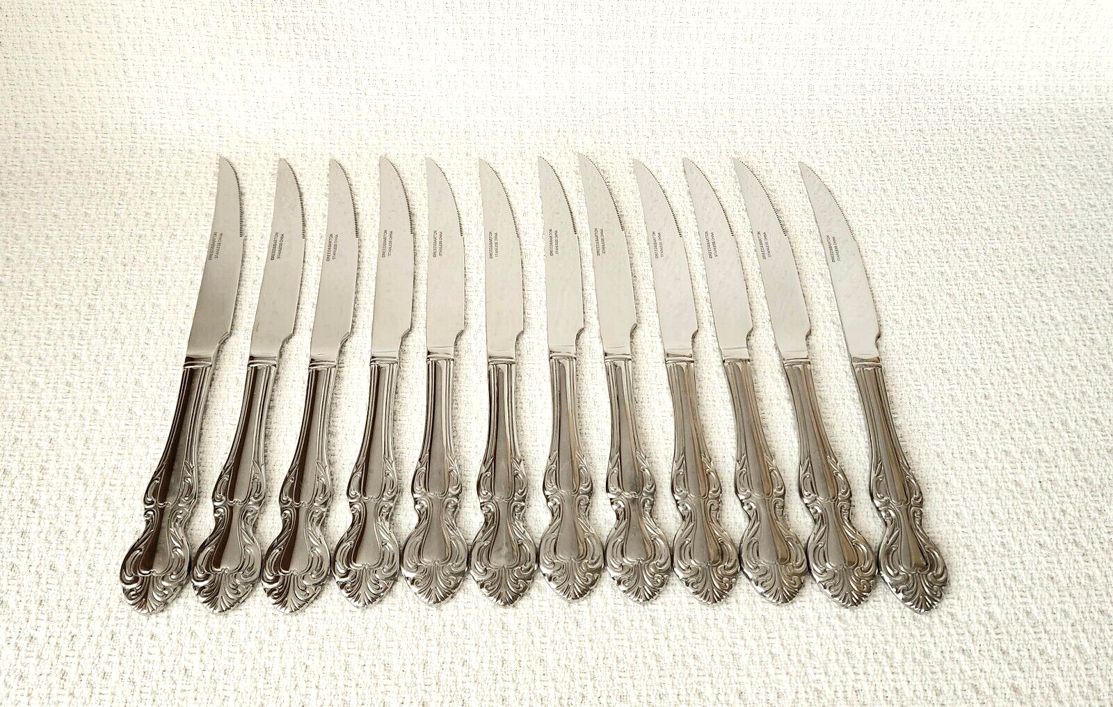 Primary image for Reed & Barton KINGS PARK Stainless Serrated Steak Knives ~ Set of 12