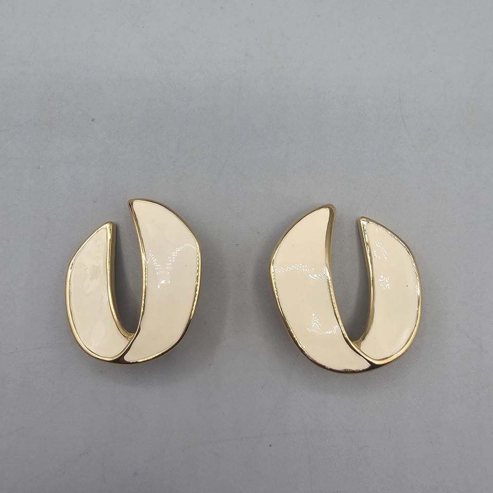 Vintage Monet Clip On Earrings Gold Tone Cream Enamel Ribbon Twist Dangle - $19.99