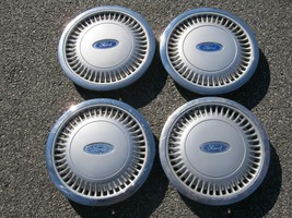 Genuine 1986 to 1991 Ford Taurus 14 inch hubcaps wheel covers - $69.78