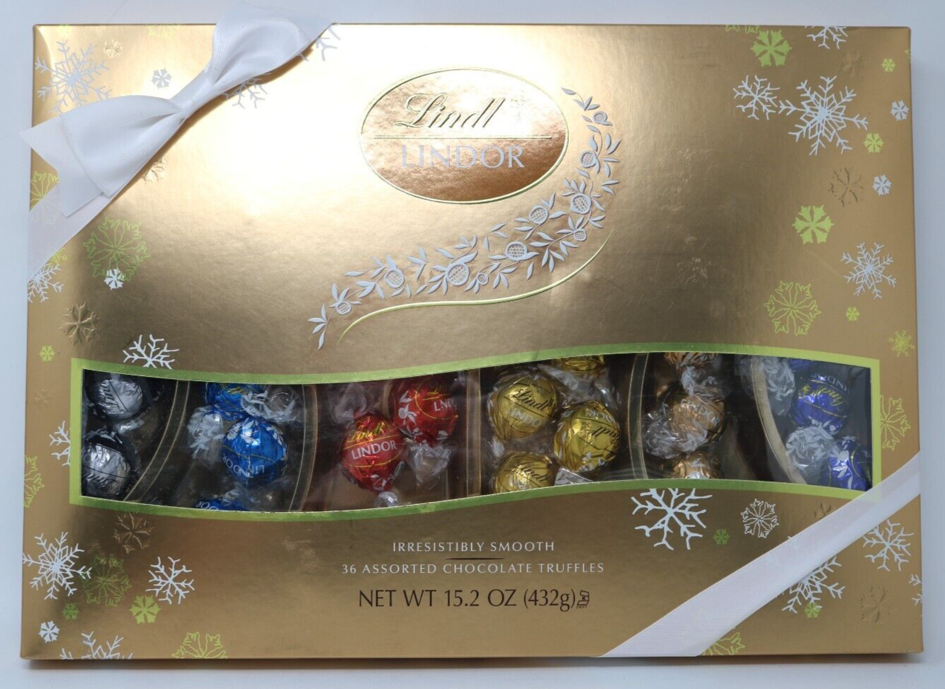 Primary image for Lindt LINDOR Holiday Deluxe Assorted Chocolate Candy Truffles Gift Box, 15.2 oz.