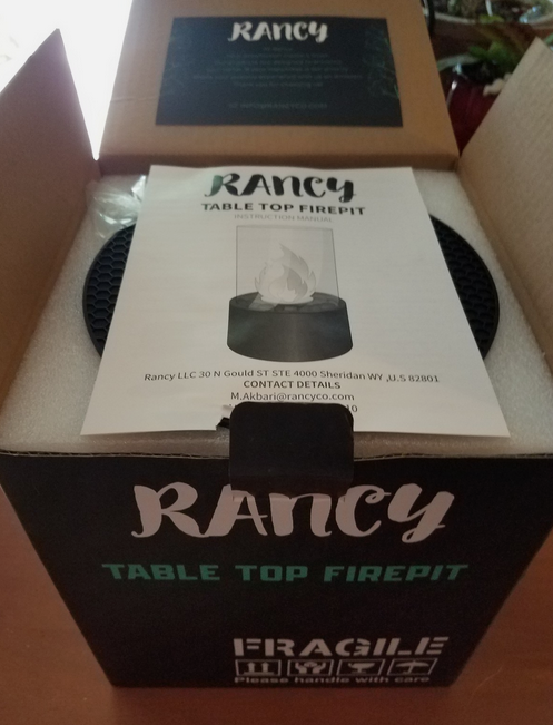 Rancy Table Top Firepit inside/outside Novelty; is a New item in open box - $20.00