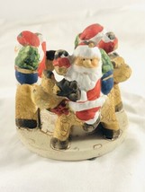 Vintage Christmas tea light ceramic candle holder fireplace and Santa Cl... - $14.83