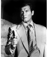 The Spy Who Loved Me Roger Moore pointing gun 12x18 Poster - $373.69 MXN