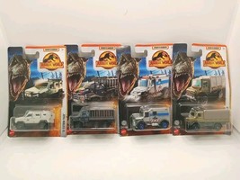 LOT OF 4 Matchbox Jurassic World Variety Trucks - $15.74