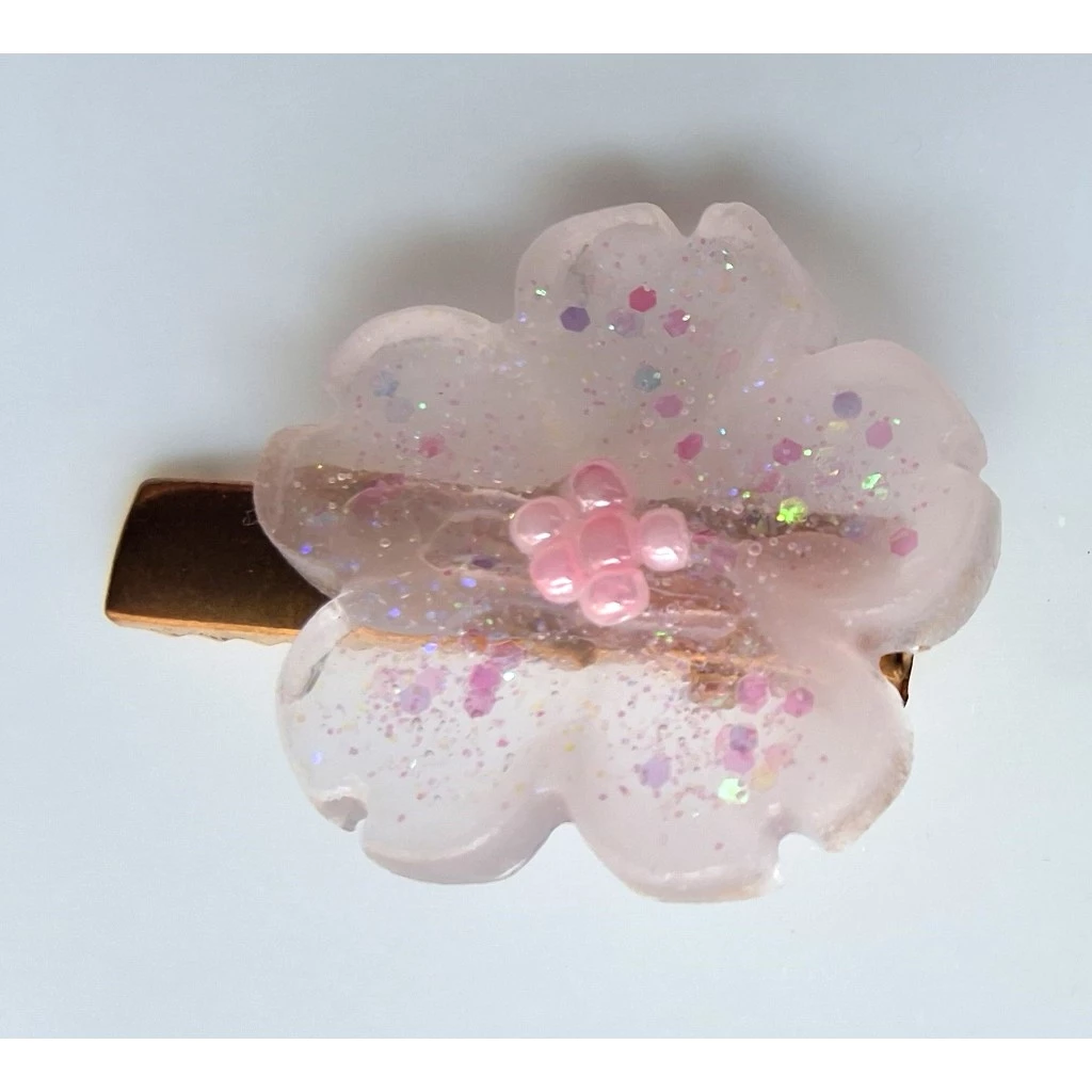 resin sakura hair clip - $5.00