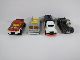 4 Die Cast Hot Wheels Truck Toy Vehicles: 41&#39; Ford Pickup, Mega Duty, Fire Eater - £4.66 GBP