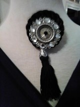 VINTAGE PIN BROOCH BLACK SILKY ROPE &amp; TASSEL W/ PEWTERY FILIGREE &amp; BLACK... - £38.28 GBP