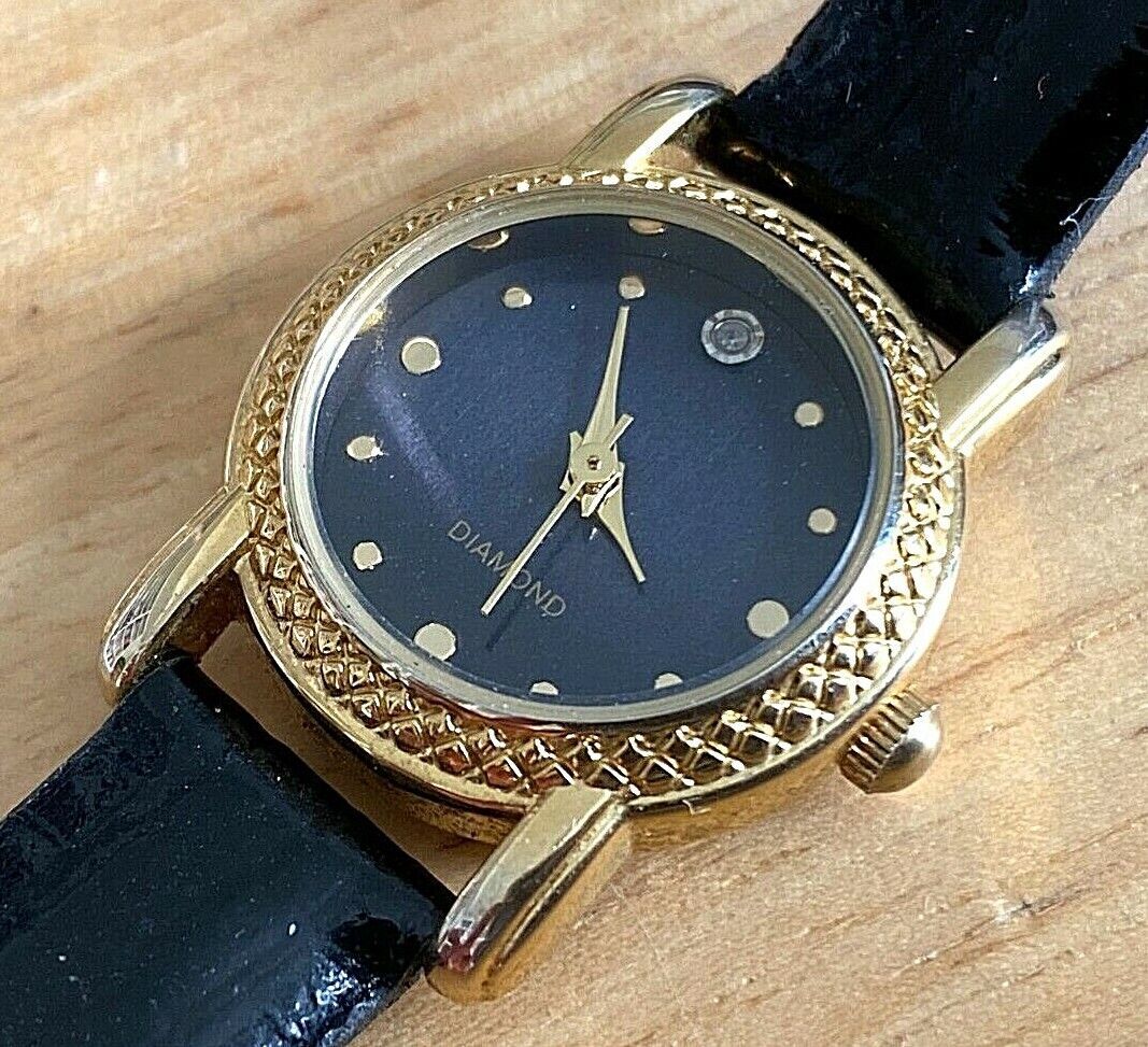 Vintage FMD Lady Gold Tone Genuine Diamond Analog Quartz Watch~New Battery - $9.50