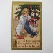 Christmas Postcard Blonde Baby Child Tree Candles Stocking Toys Gold Antique - £7.81 GBP