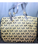 Michal Kors Bag Black And Beige Bag With Black Handle And Metal Charm - $52.10 CAD