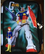 double-sided pouch featuring new and old Gundam model package art - $569.90 MXN