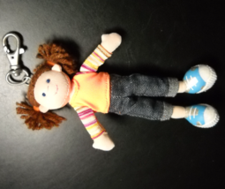Russ Key Chain Little Brown Haired Cloth Girl wearing Blue Jeans and Orange Top - $6.99