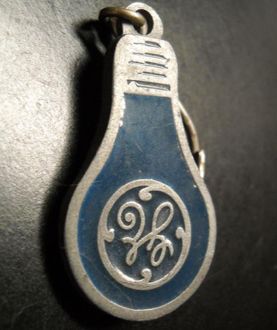 GE Light Bulb Key Chain Light Bulb Shaped Steel Colored Metal with Blue Enamel - $7.99