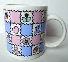 Easter Mug Pastel Pink and Blue Colors Bunnies Eggs and Hearts Decorated - $6.77