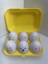 Vintage TOMY Egg Shape Sorting Hide N Squeak Toy 1993 Egg Carton Yellow ... - $9.49
