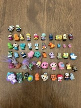 Hatchimals CollEGGtibles Lot of 52 Assorted Beauty Beast Sponge Bob Hello Kitty - $24.63