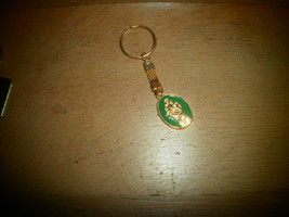 Saint Key Chain Gold Tone with Green Enamel  - €4,37 EUR