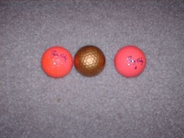 2 Vintage 1980&#39;s Pink Spalding Flying Lady Golf Balls and One Gold Golf ... - £6.12 GBP