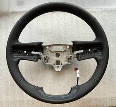 Factory original black leather steering wheel for some 2019+ GMC Sierra ... - $28.49