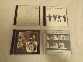 Four Beatles CDs – Lot A - Let It Be/HELP/Let It Be Naked/Free As a Bird - £25.14 GBP