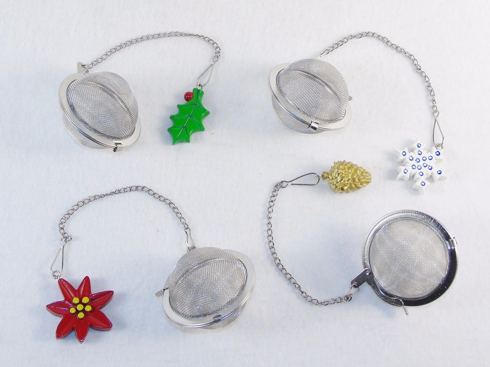 Primary image for 2” Stainless Steel Tea Ball Infusers, Set of 4 Assorted Holiday Charms On Chains