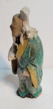 Chinese Shekwan Mud Man Carrying Book image 2